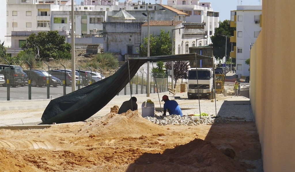 workers outside in a city construction site